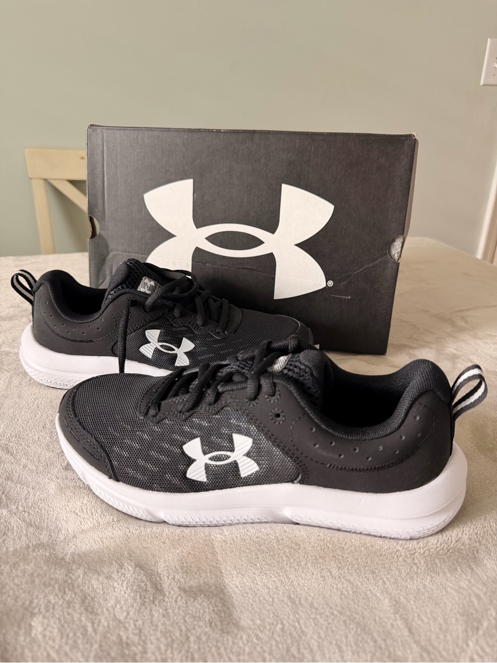 Under Armour UA BGS Assert 10 - Kids Black and White Logo Athletic Sneakers
